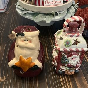 Two Santa clause candle holders
